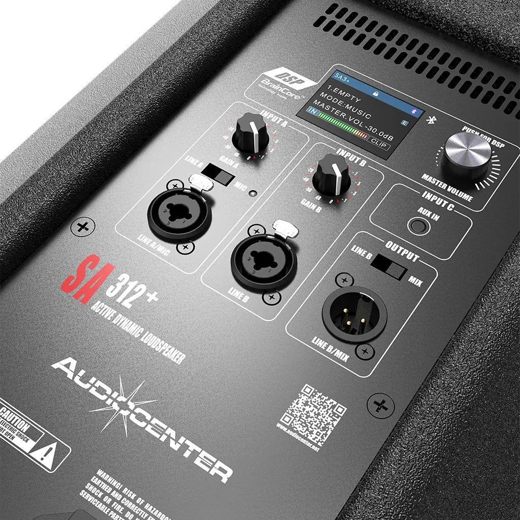 Control panel of an Audiocenter speaker with various knobs and ports.