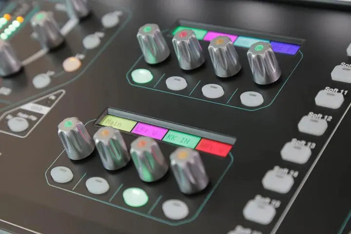 Control panel with knobs and buttons on a dark surface