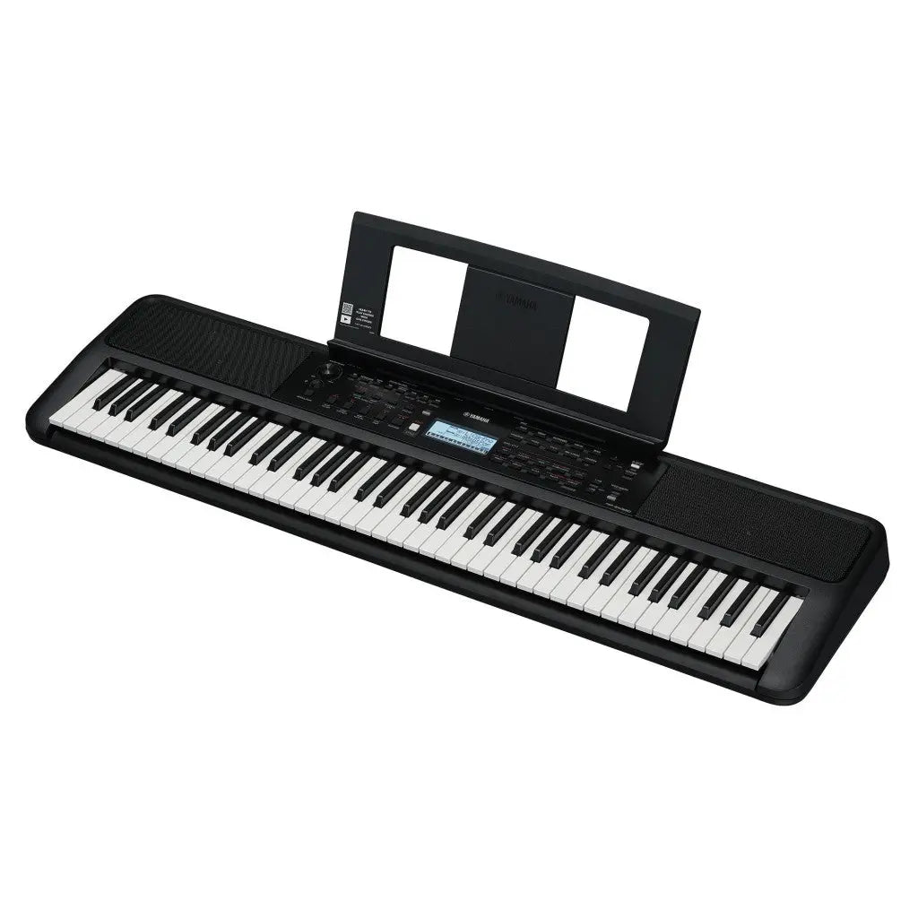 Black digital piano with white keys on a white background