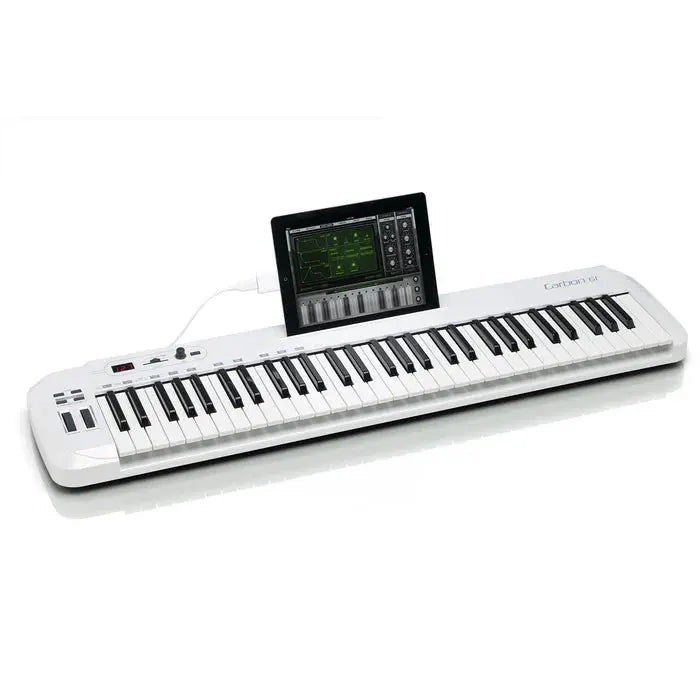 Digital keyboard with a tablet on top displaying music software