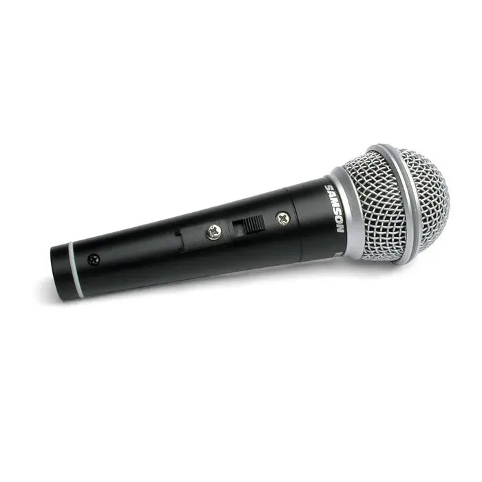 Musician performing with Samson R21S dynamic microphone on stage.