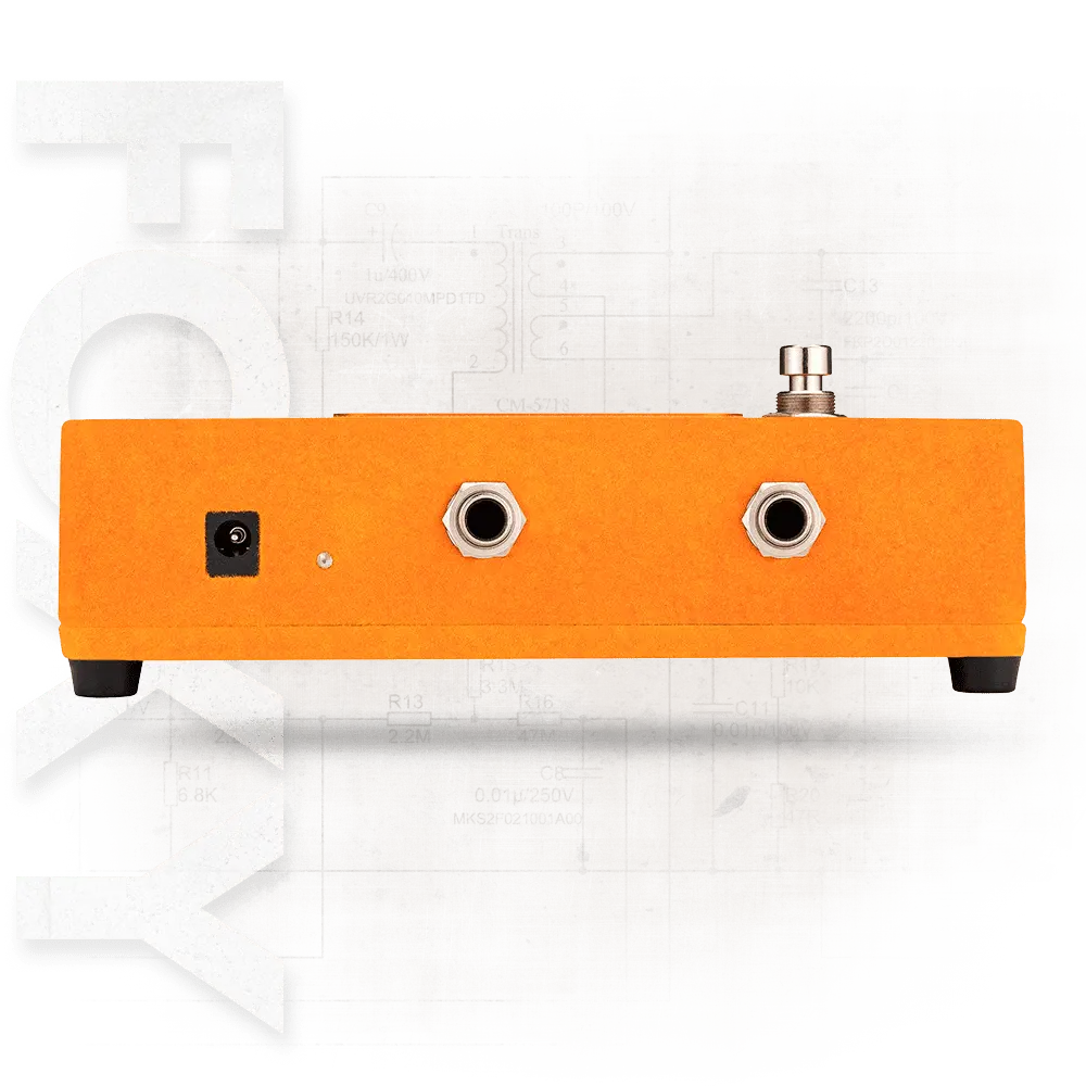 Warm Audio foxy tone box Orange metal component with multiple holes on a technical 