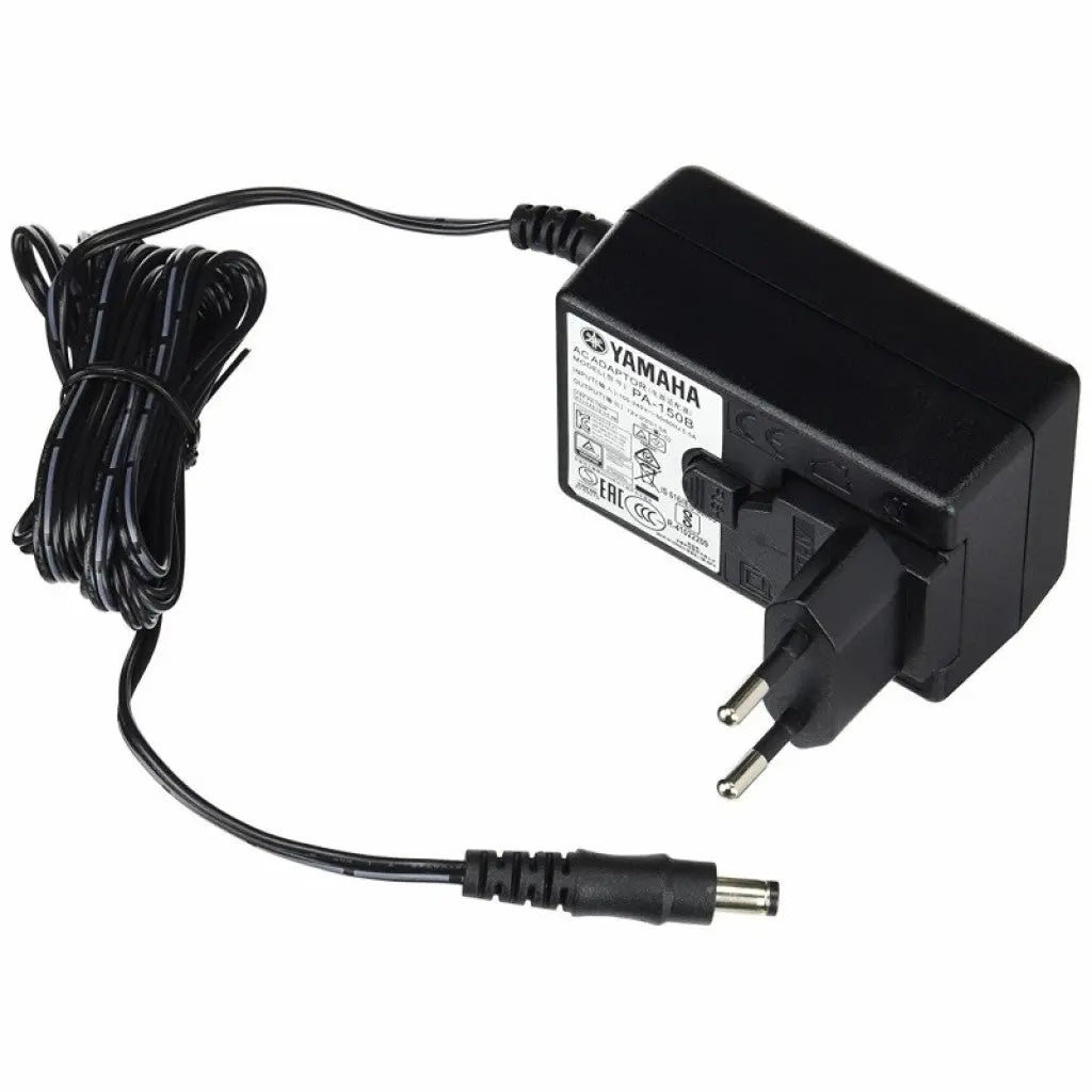Yamaha PA-150B adapter showing voltage and polarity markings.