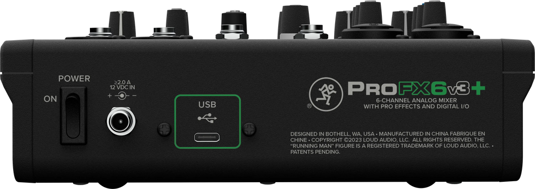 Back view of a ProFX6 v3+ audio mixer with control knobs and USB port.